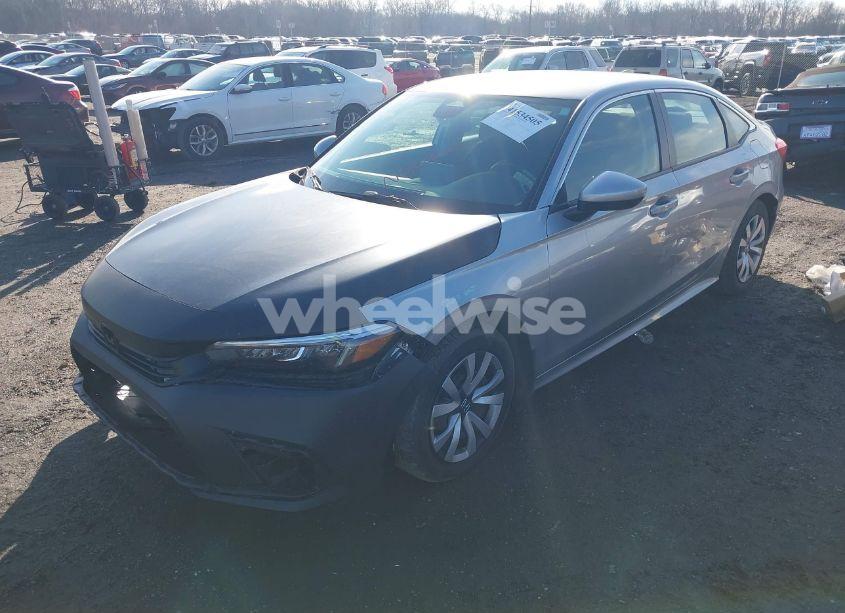 Photo 2 of 2022 Honda Civic LX (VIN 2HGFE2F25NH574209)