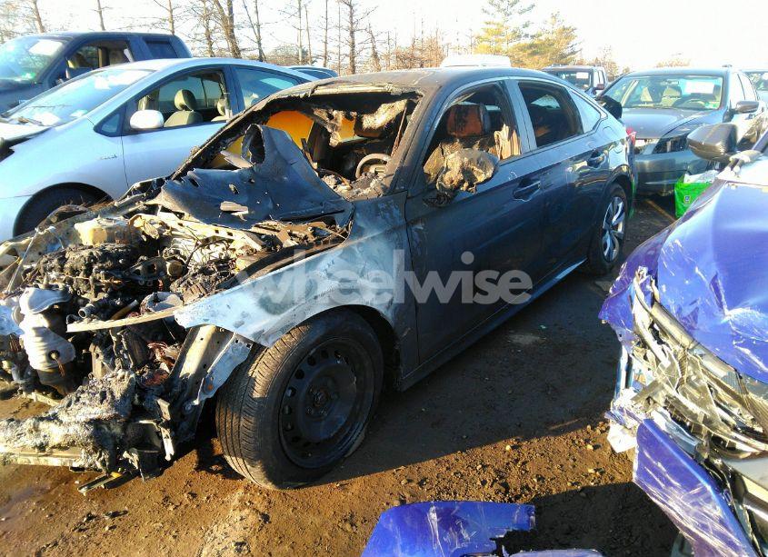 Photo 2 of 2022 Honda Civic LX (VIN 2HGFE2F26NH506887)