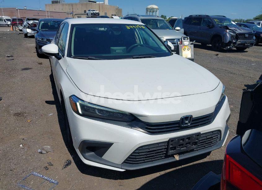 Photo 12 of 2022 Honda Civic LX (VIN 2HGFE2F26NH527285)