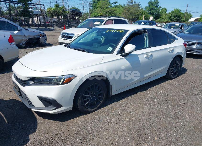 Photo 2 of 2022 Honda Civic LX (VIN 2HGFE2F26NH527285)