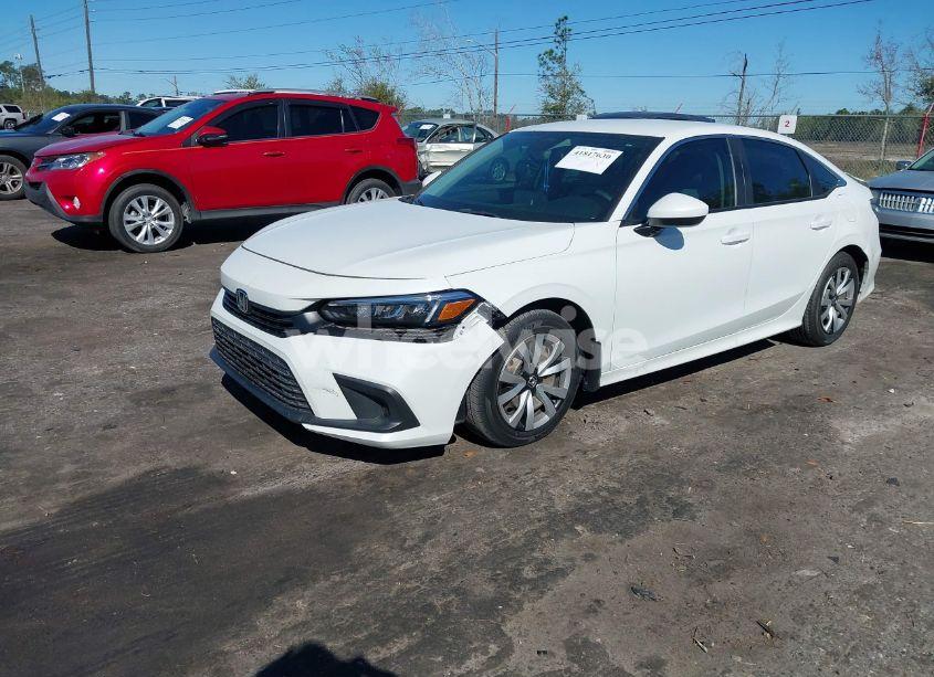 Photo 2 of 2022 Honda Civic LX (VIN 2HGFE2F26NH545818)