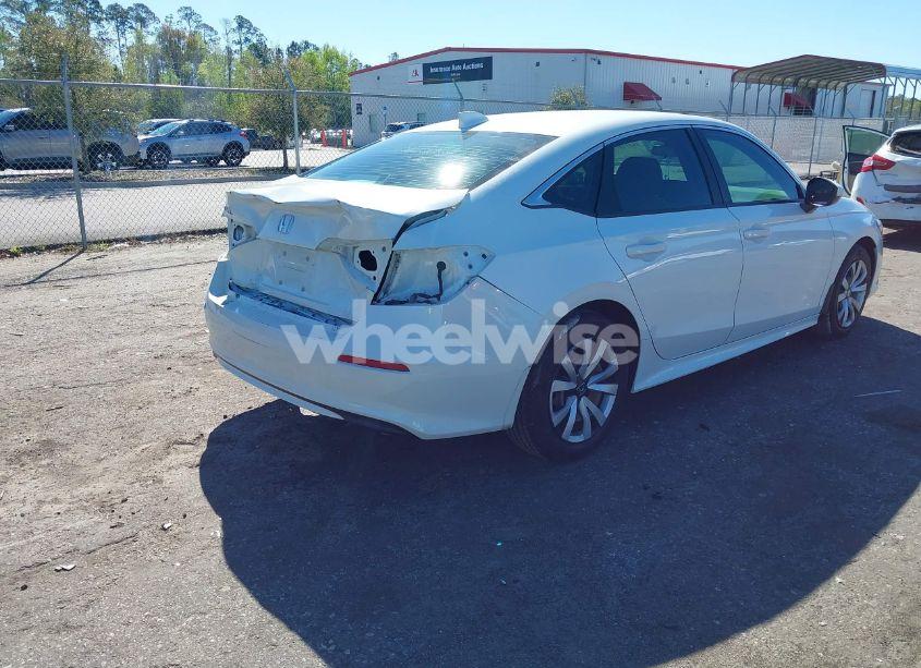 Photo 4 of 2022 Honda Civic LX (VIN 2HGFE2F26NH545818)