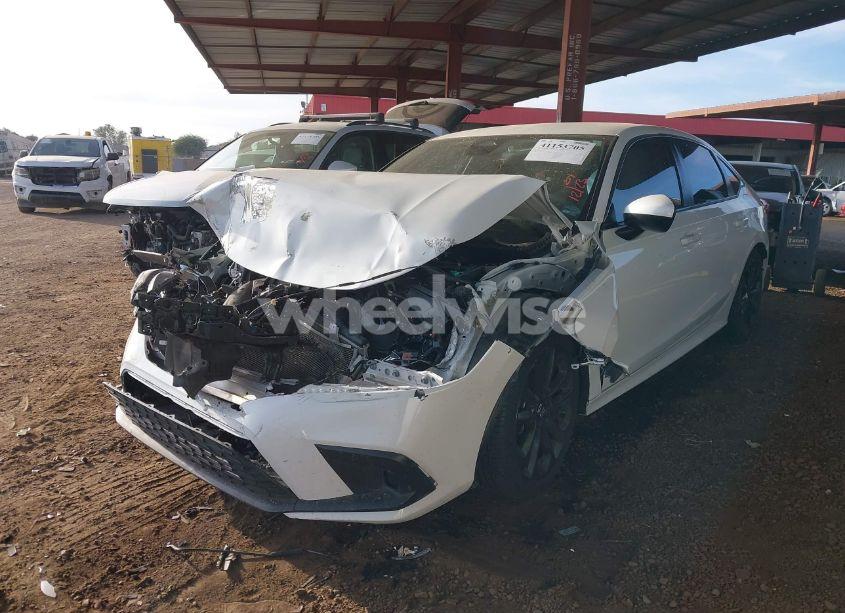 Photo 2 of 2022 Honda Civic LX (VIN 2HGFE2F26NH546709)