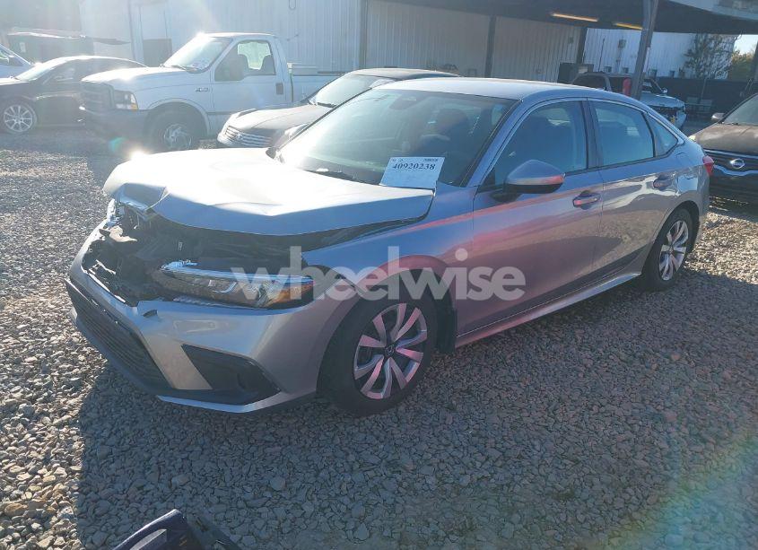 Photo 2 of 2022 Honda Civic LX (VIN 2HGFE2F27NH558920)