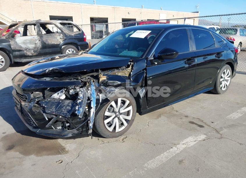Photo 2 of 2022 Honda Civic LX (VIN 2HGFE2F28NH505689)