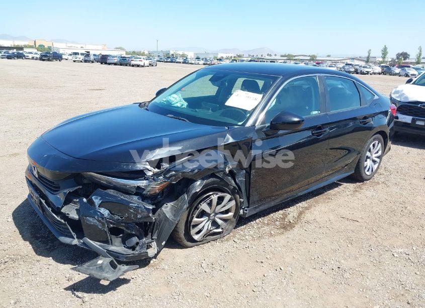 Photo 2 of 2022 Honda Civic LX (VIN 2HGFE2F28NH514361)