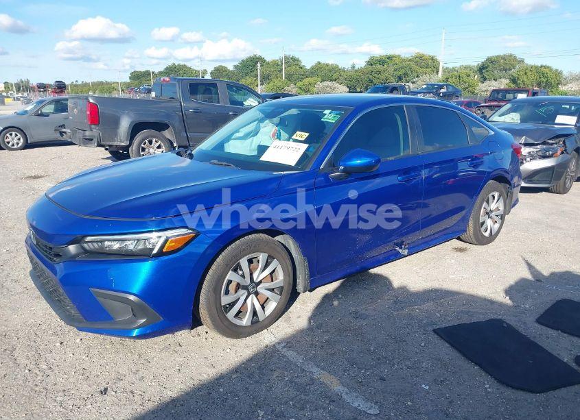 Photo 2 of 2022 Honda Civic LX (VIN 2HGFE2F29NH529211)