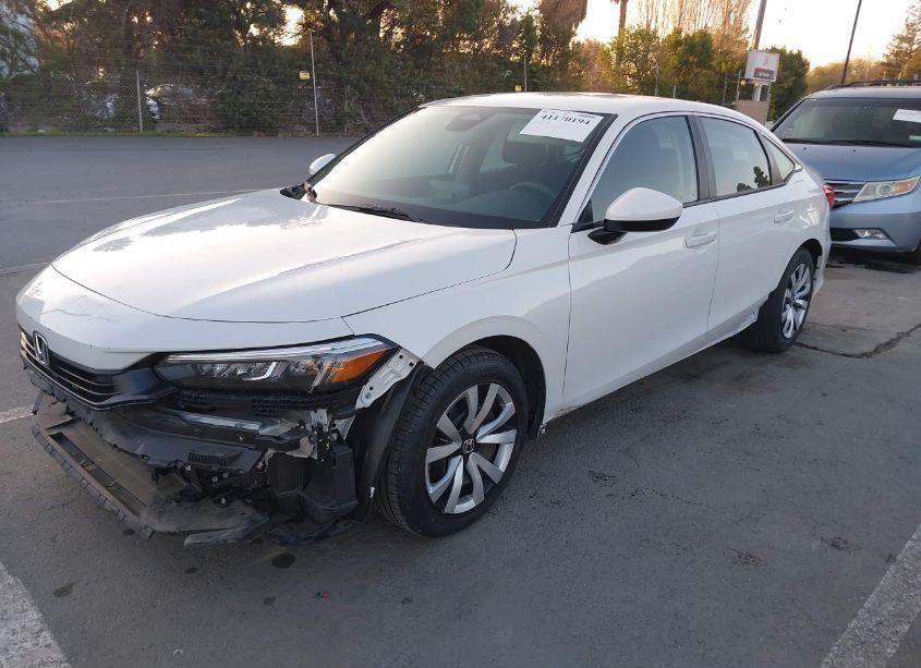 Photo 2 of 2022 Honda Civic LX (VIN 2HGFE2F29NH559549)