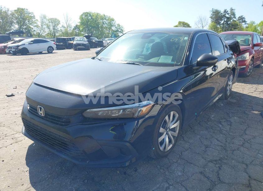 Photo 2 of 2024 Honda Civic LX (VIN 2HGFE2F29RH557001)