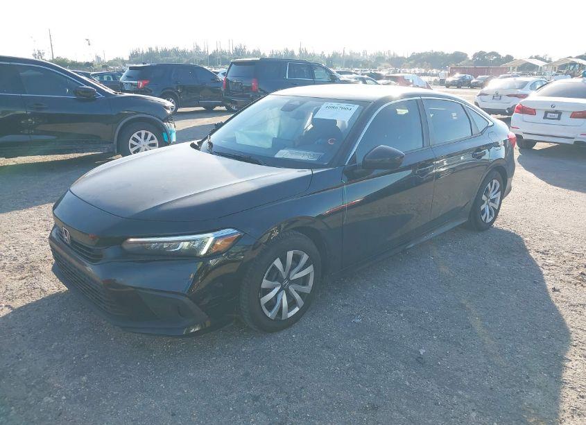 Photo 2 of 2022 Honda Civic LX (VIN 2HGFE2F2XNH516029)