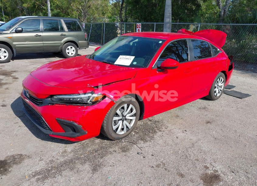 Photo 2 of 2022 Honda Civic LX (VIN 2HGFE2F2XNH528794)