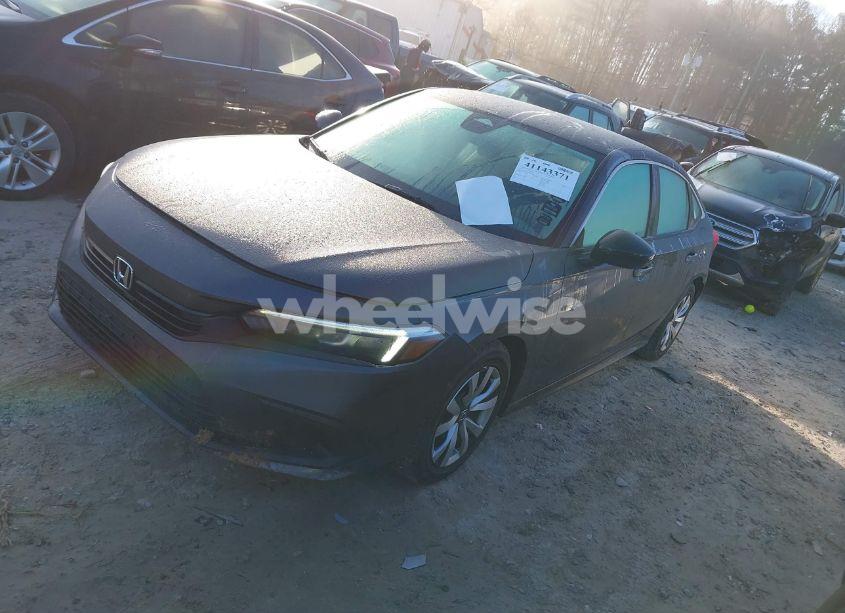 Photo 2 of 2022 Honda Civic LX (VIN 2HGFE2F2XNH549077)