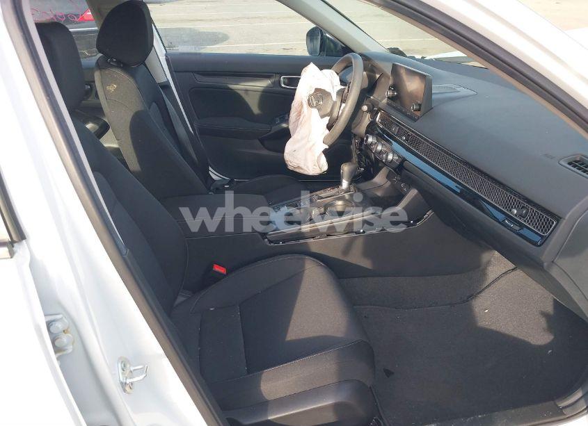 Photo 5 of 2024 Honda Civic LX (VIN 2HGFE2F2XRH556519)