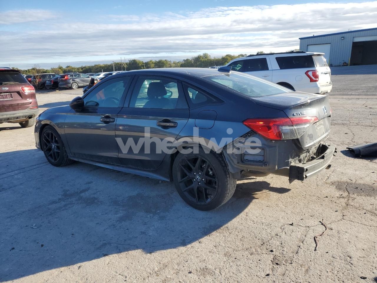 Photo 2 of 2023 HONDA CIVIC SPORT (VIN 2HGFE2F51PH519124)