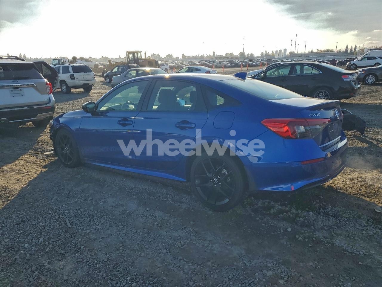 Photo 2 of 2022 HONDA CIVIC SPORT (VIN 2HGFE2F52NH556552)