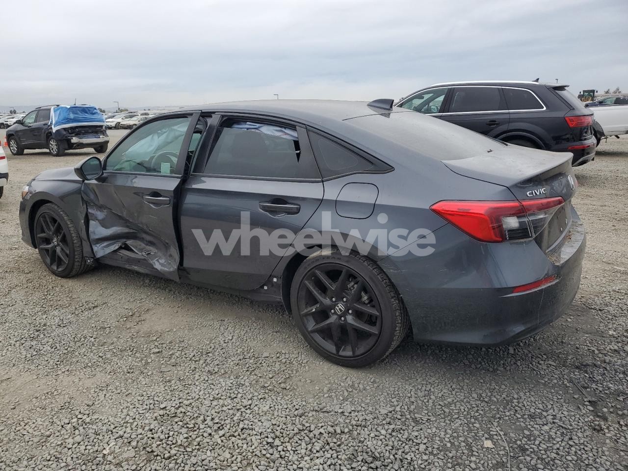 Photo 2 of 2024 HONDA CIVIC SPORT (VIN 2HGFE2F52RH511309)