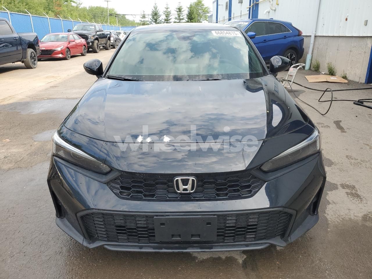 Photo 5 of 2025 HONDA CIVIC SPOR (VIN 2HGFE2F52SH101857)