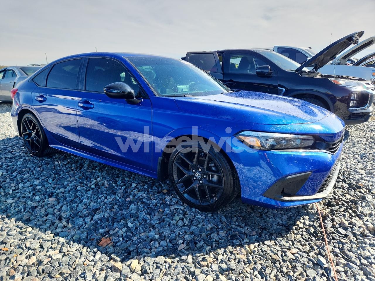 Photo 4 of 2024 HONDA CIVIC SPORT (VIN 2HGFE2F53RH565766)