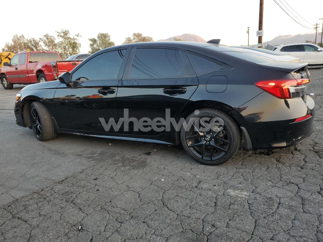 Photo 2 of 2022 HONDA CIVIC SPORT (VIN 2HGFE2F57NH606703)