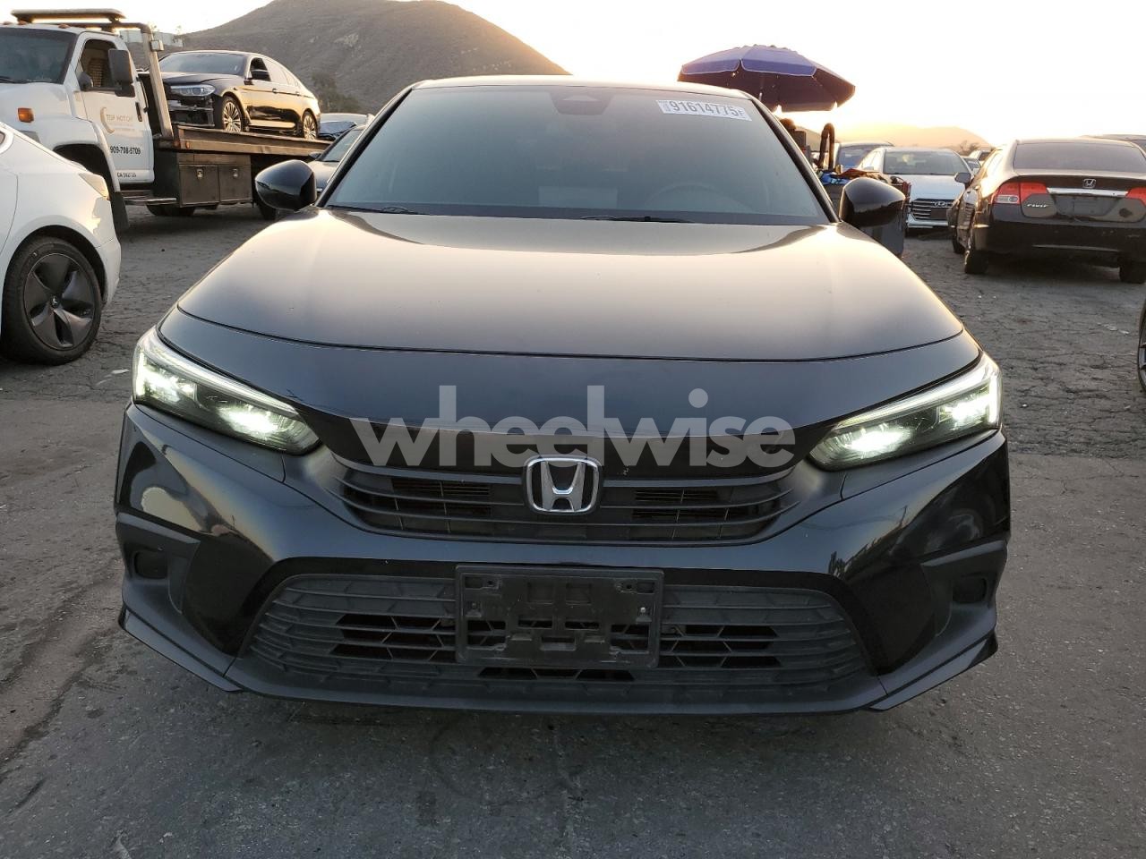 Photo 5 of 2022 HONDA CIVIC SPORT (VIN 2HGFE2F57NH606703)