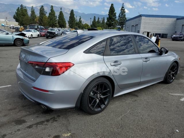 Photo 2 of 2022 HONDA CIVIC SPORT (VIN 2HGFE2F58NH554465)
