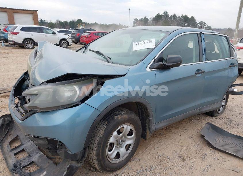 Photo 2 of 2014 Honda Cr-v LX (VIN 2HKRM3H30EH566701)