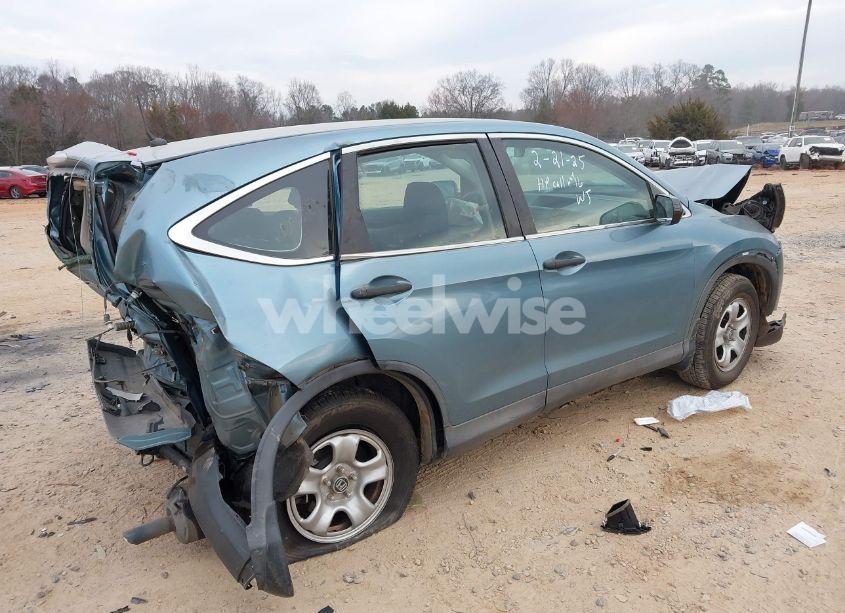 Photo 4 of 2014 Honda Cr-v LX (VIN 2HKRM3H30EH566701)