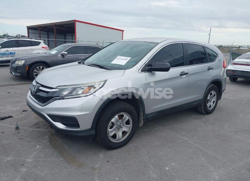 Photo 2 of 2015 Honda Cr-v LX (VIN 2HKRM3H30FH550631)