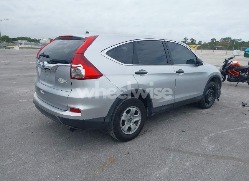 Photo 4 of 2015 Honda Cr-v LX (VIN 2HKRM3H30FH550631)