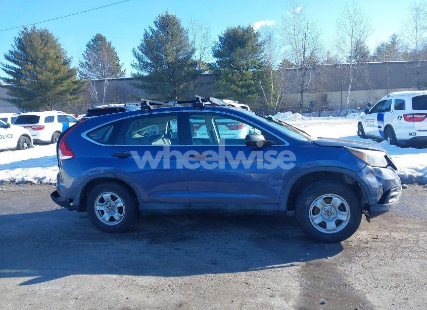 Photo 11 of 2014 Honda Cr-v LX (VIN 2HKRM3H31EH502974)