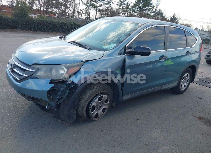 Photo 2 of 2014 Honda Cr-v LX (VIN 2HKRM3H31EH545484)