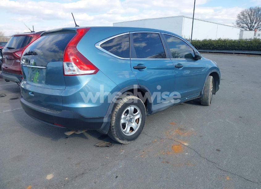 Photo 4 of 2014 Honda Cr-v LX (VIN 2HKRM3H31EH545484)