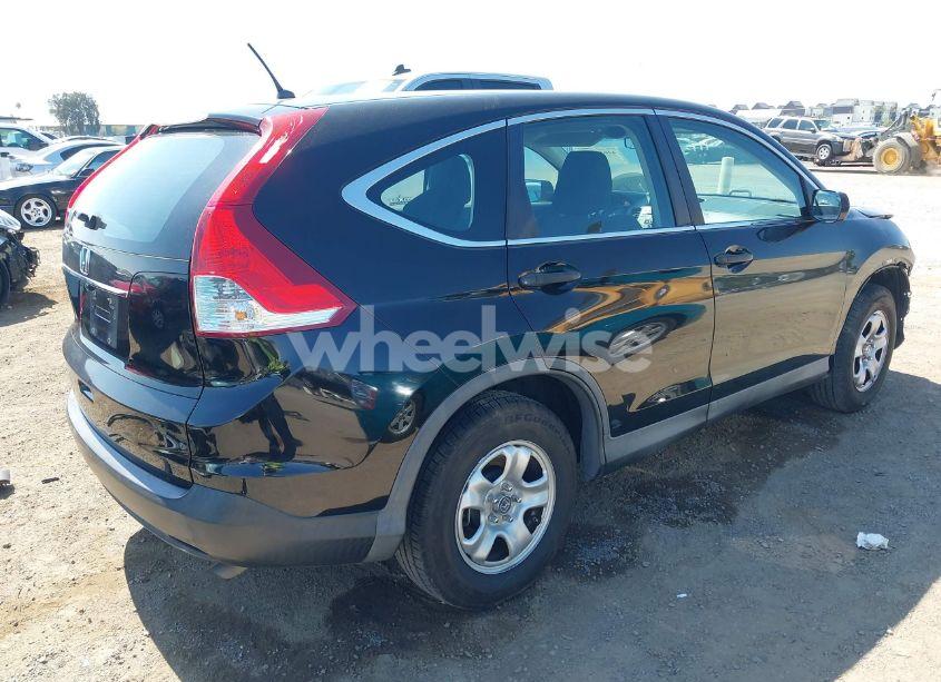 Photo 4 of 2013 Honda Cr-v LX (VIN 2HKRM3H32DH519524)