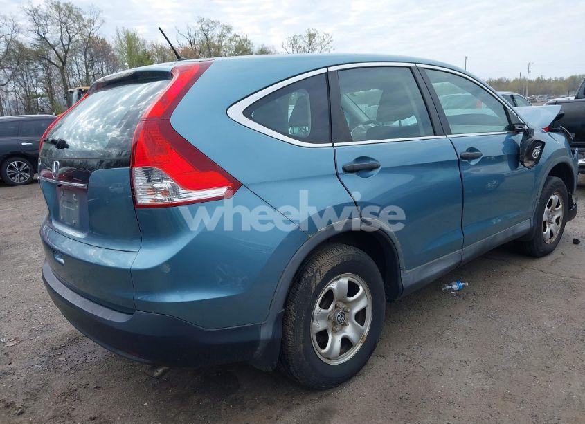 Photo 4 of 2014 Honda Cr-v LX (VIN 2HKRM3H32EH517323)