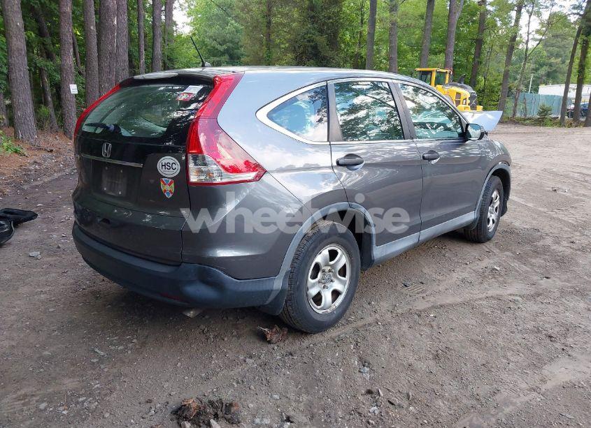 Photo 4 of 2014 Honda Cr-v LX (VIN 2HKRM3H32EH521405)