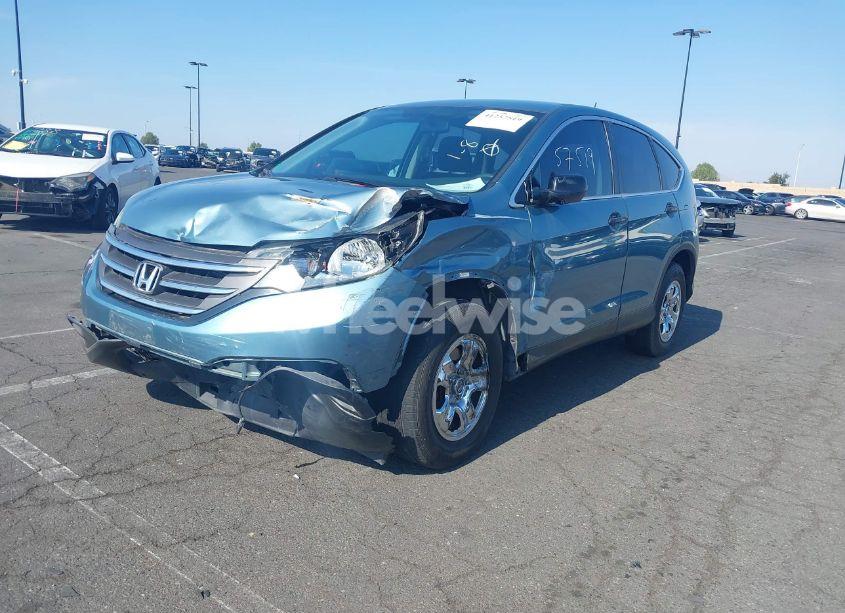 Photo 2 of 2014 Honda Cr-v LX (VIN 2HKRM3H32EH558812)