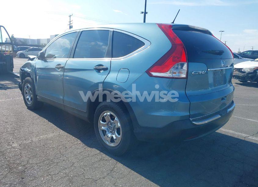 Photo 3 of 2014 Honda Cr-v LX (VIN 2HKRM3H32EH558812)