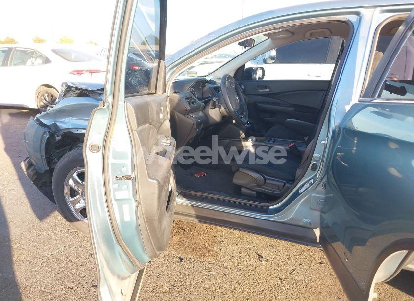 Photo 5 of 2014 Honda Cr-v LX (VIN 2HKRM3H32EH558812)