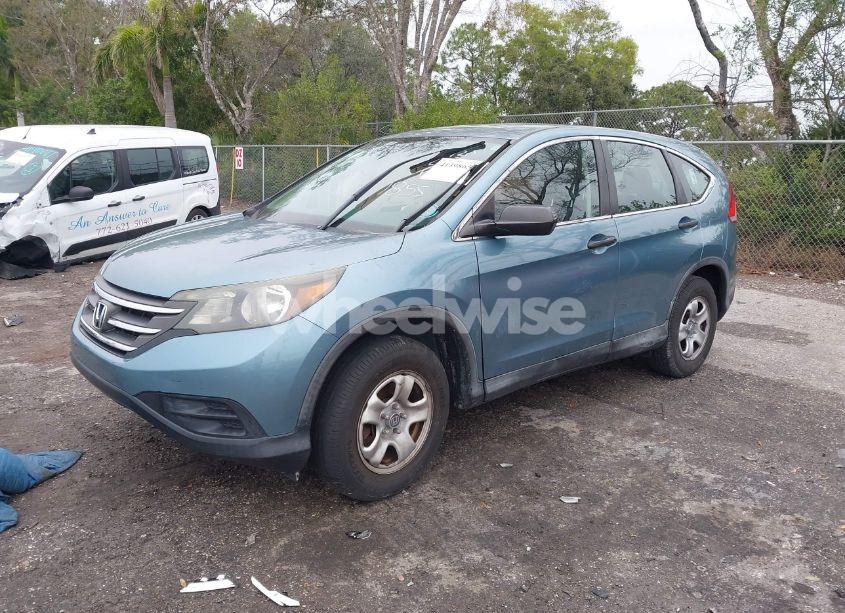 Photo 2 of 2014 Honda Cr-v LX (VIN 2HKRM3H32EH561855)