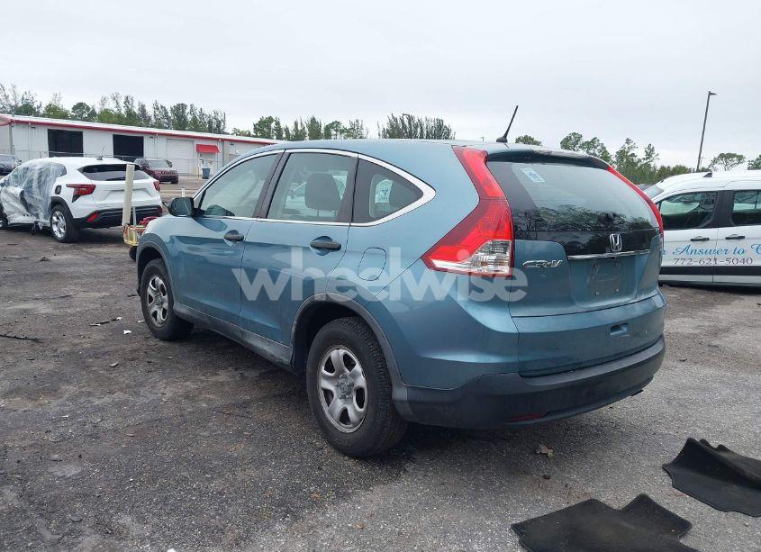 Photo 3 of 2014 Honda Cr-v LX (VIN 2HKRM3H32EH561855)