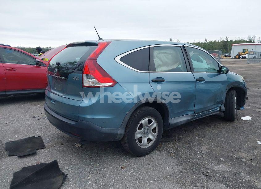 Photo 4 of 2014 Honda Cr-v LX (VIN 2HKRM3H32EH561855)