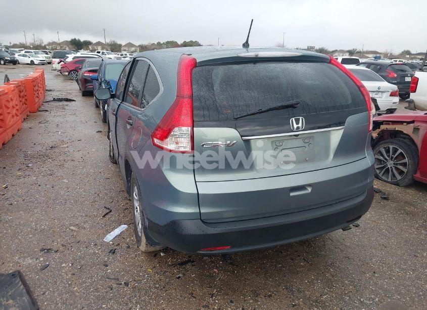Photo 3 of 2012 Honda Cr-v LX (VIN 2HKRM3H33CH513021)