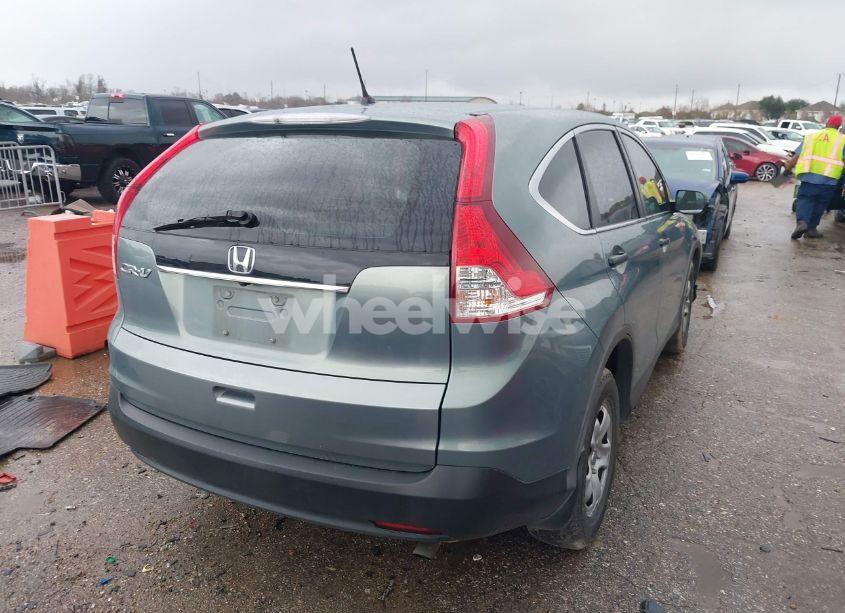 Photo 4 of 2012 Honda Cr-v LX (VIN 2HKRM3H33CH513021)