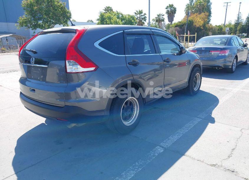 Photo 4 of 2014 Honda Cr-v LX (VIN 2HKRM3H33EH504418)