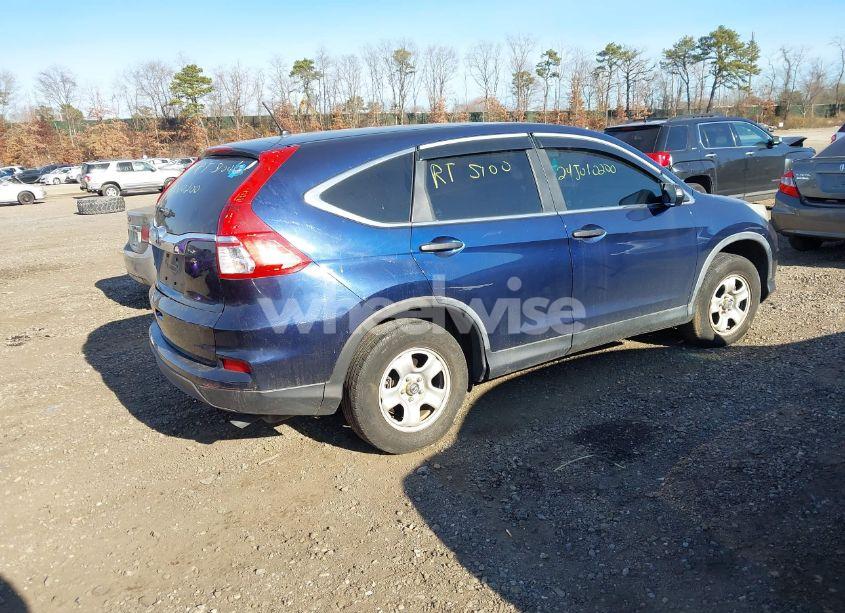 Photo 4 of 2015 Honda Cr-v LX (VIN 2HKRM3H33FH512438)