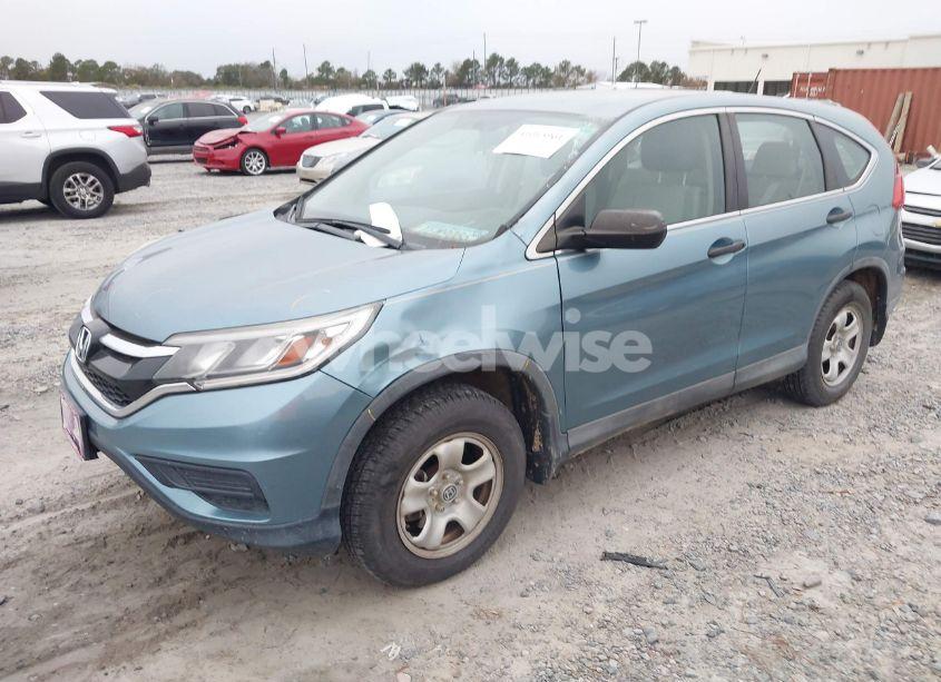Photo 2 of 2015 Honda Cr-v LX (VIN 2HKRM3H33FH523889)