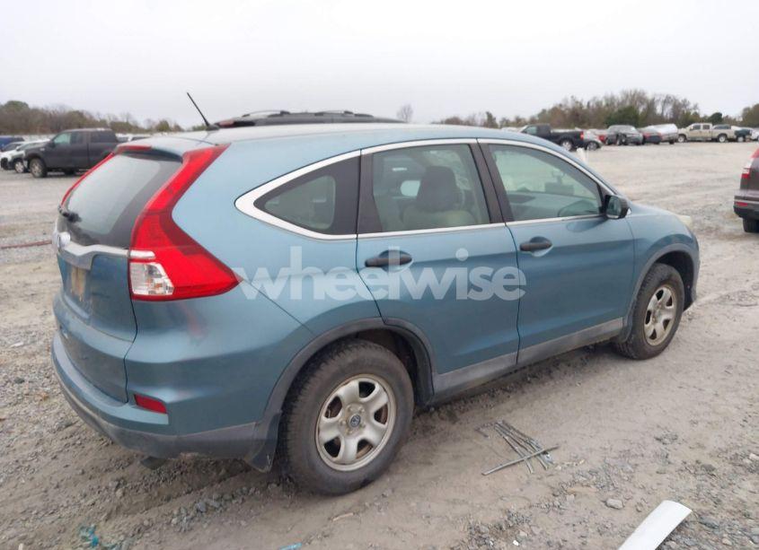 Photo 4 of 2015 Honda Cr-v LX (VIN 2HKRM3H33FH523889)