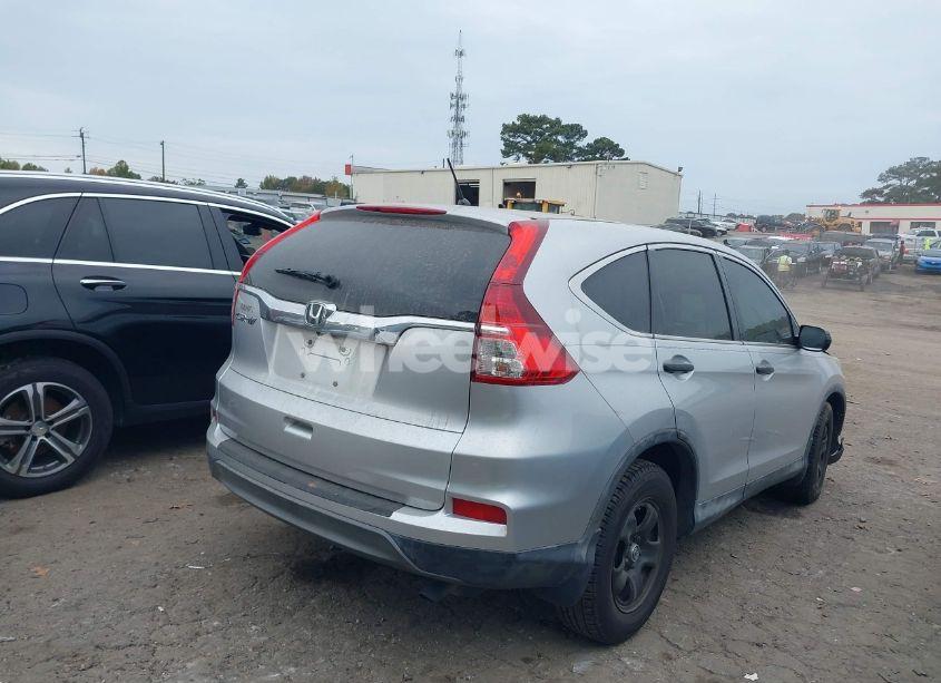 Photo 4 of 2016 Honda Cr-v LX (VIN 2HKRM3H33GH545425)