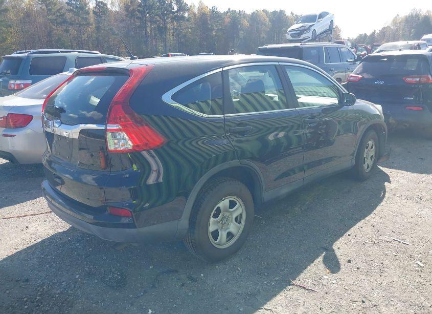 Photo 4 of 2015 Honda Cr-v LX (VIN 2HKRM3H34FH512397)