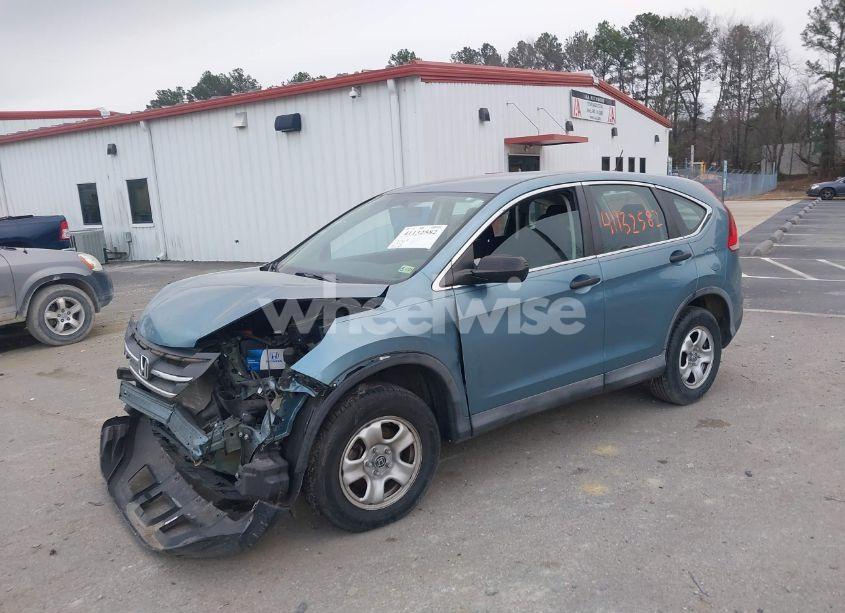 Photo 2 of 2014 Honda Cr-v LX (VIN 2HKRM3H36EH517308)